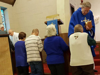 Pastor Giving Communion Pastor Giving Communion
