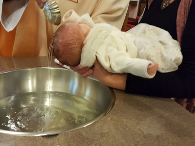 Baby Being Baptized